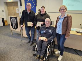 Der Vorsitz des Inklusionsbeirates (v. l.) Norbert Schmitt, Janina Schulte, Olaf Jung und Bürgermeisterin Manuela Schmidt. 